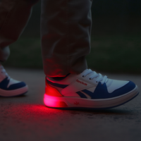 Child in light-up Reebok sneakers