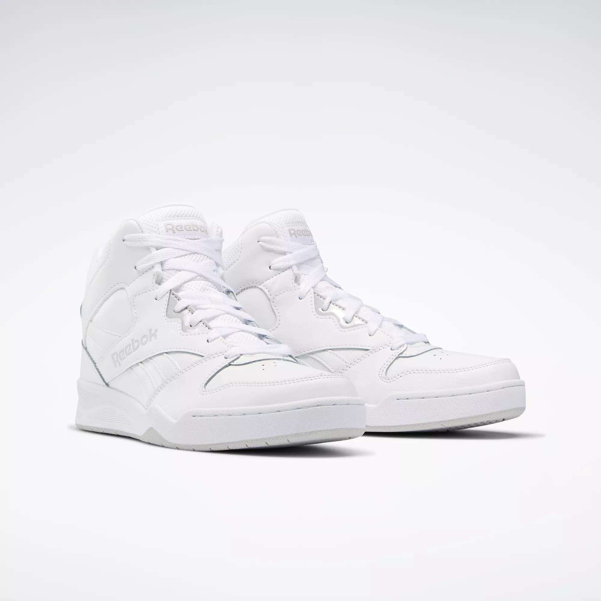 The Reebok Men's Royal BB4500 Hi 2.0 Shoes feature a white leather upper, minimalist design, and subtle branding on the side and tongue, shown against a plain light background.