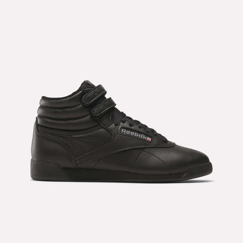 The Reebok Freestyle Hi Women's Shoes feature a black leather upper, two Velcro ankle straps, laces, and a side Reebok logo patch—ideal for women's fitness and shown against a white background.