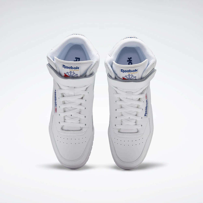 The Reebok Men's EX-O-FIT Hi Shoes feature a classic white leather look, old-school design, Reebok logos on the tongue and side, white laces, and perforated toe detailing—all viewed from above.
