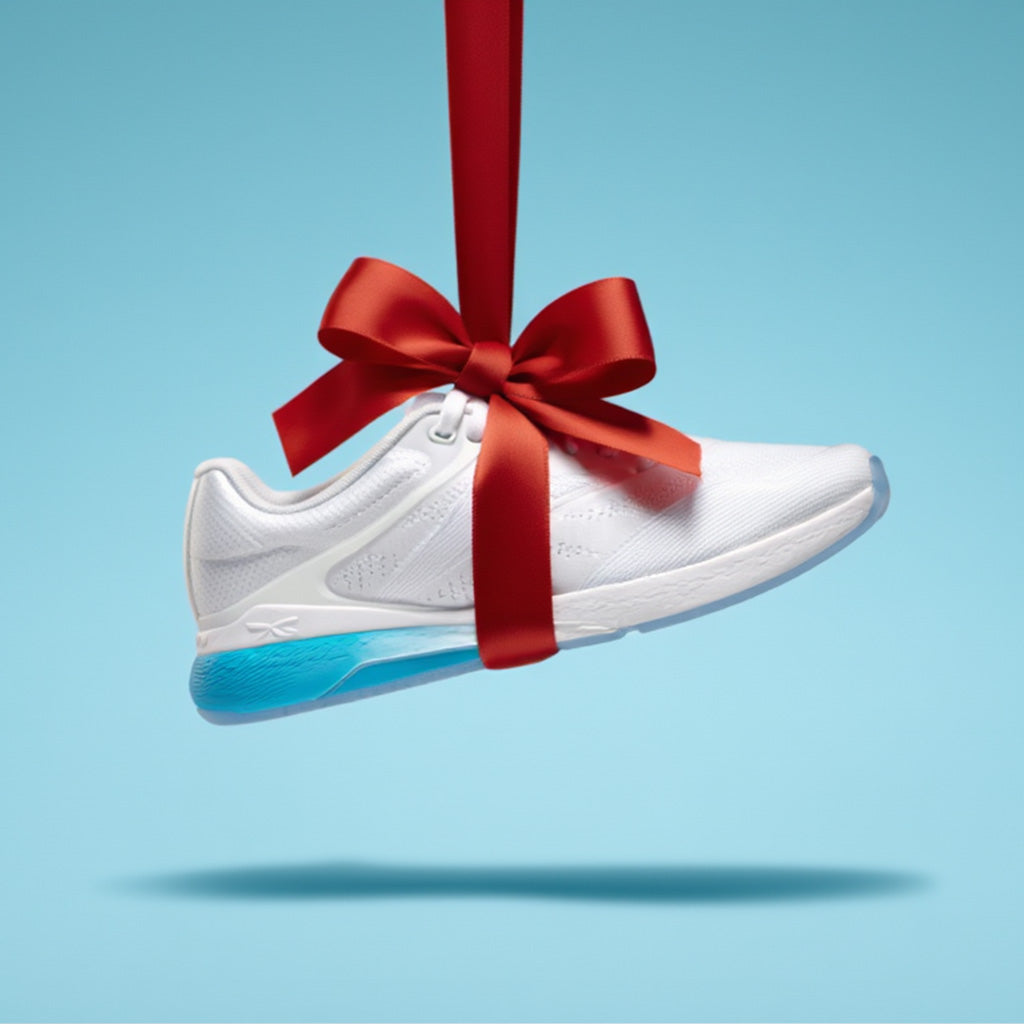White sneaker with a red ribbon on a light blue background
