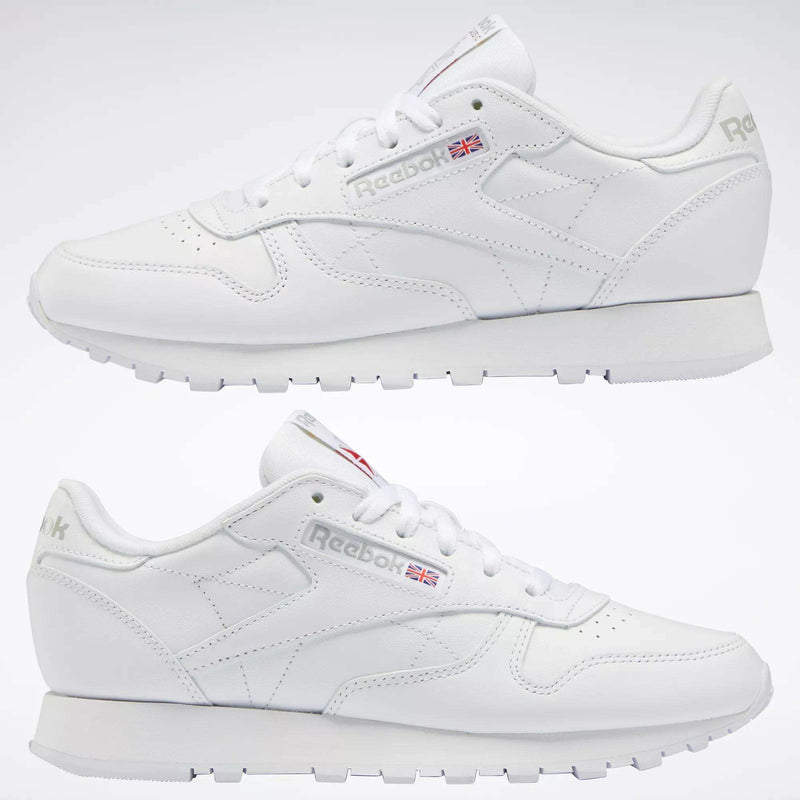 Reebok Women's Classic Leather Shoes with cushioned midsole, Reebok logo, and Union Jack flag on the side, shown in side profile against a plain light background.