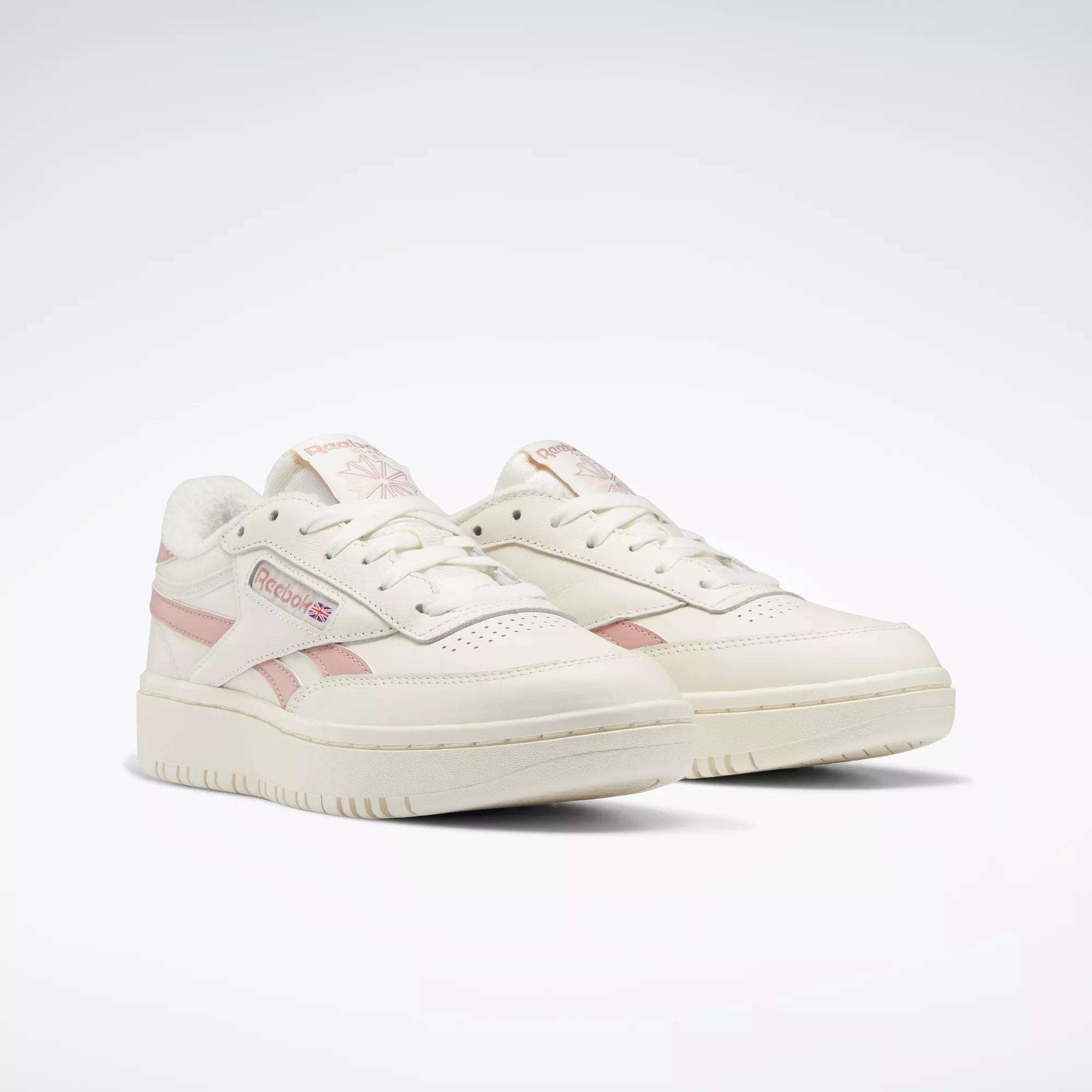 The Reebok Women's Club C Double Revenge Shoes feature a white court-inspired design, leather upper, and a stylish double outsole.