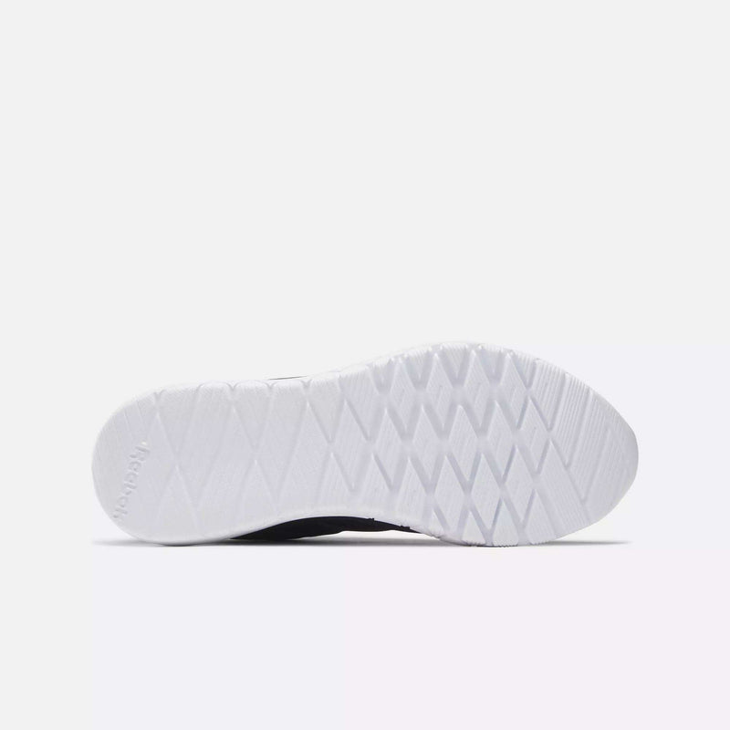 The image shows the white rubber sole of the Reebok Men's Flexagon Energy 4 Training Shoes, viewed from below, with a diamond-shaped tread pattern on a plain white background.
