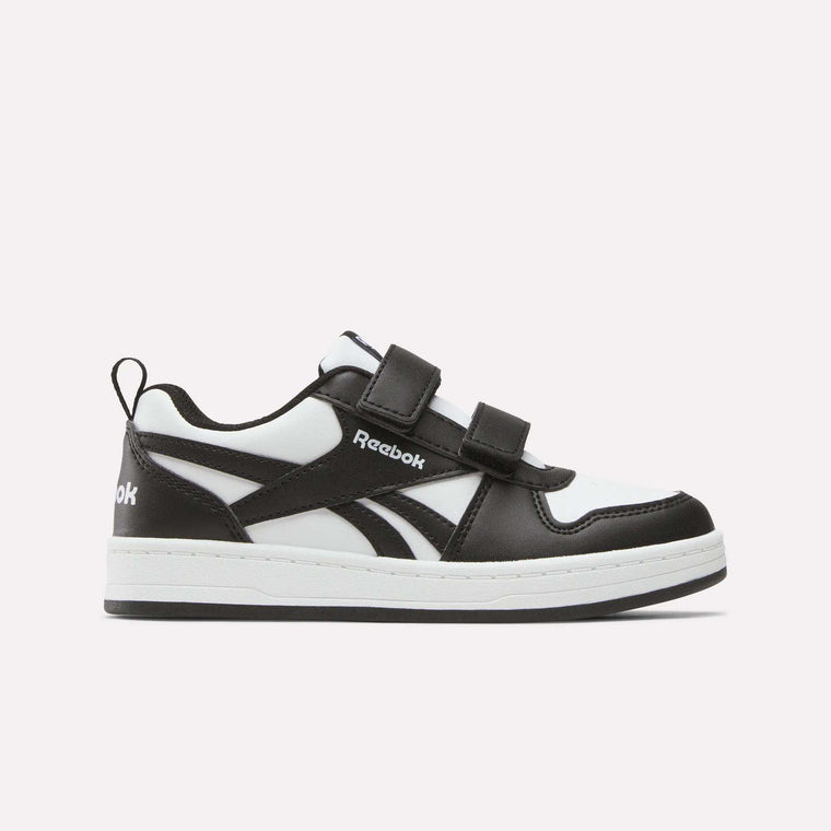 The Kids' Reebok Royal Prime 2 Shoes by Reebok are black and white sneakers featuring two hook-and-loop straps, a white sole, and the Reebok logo on the side, shown against a plain light background.