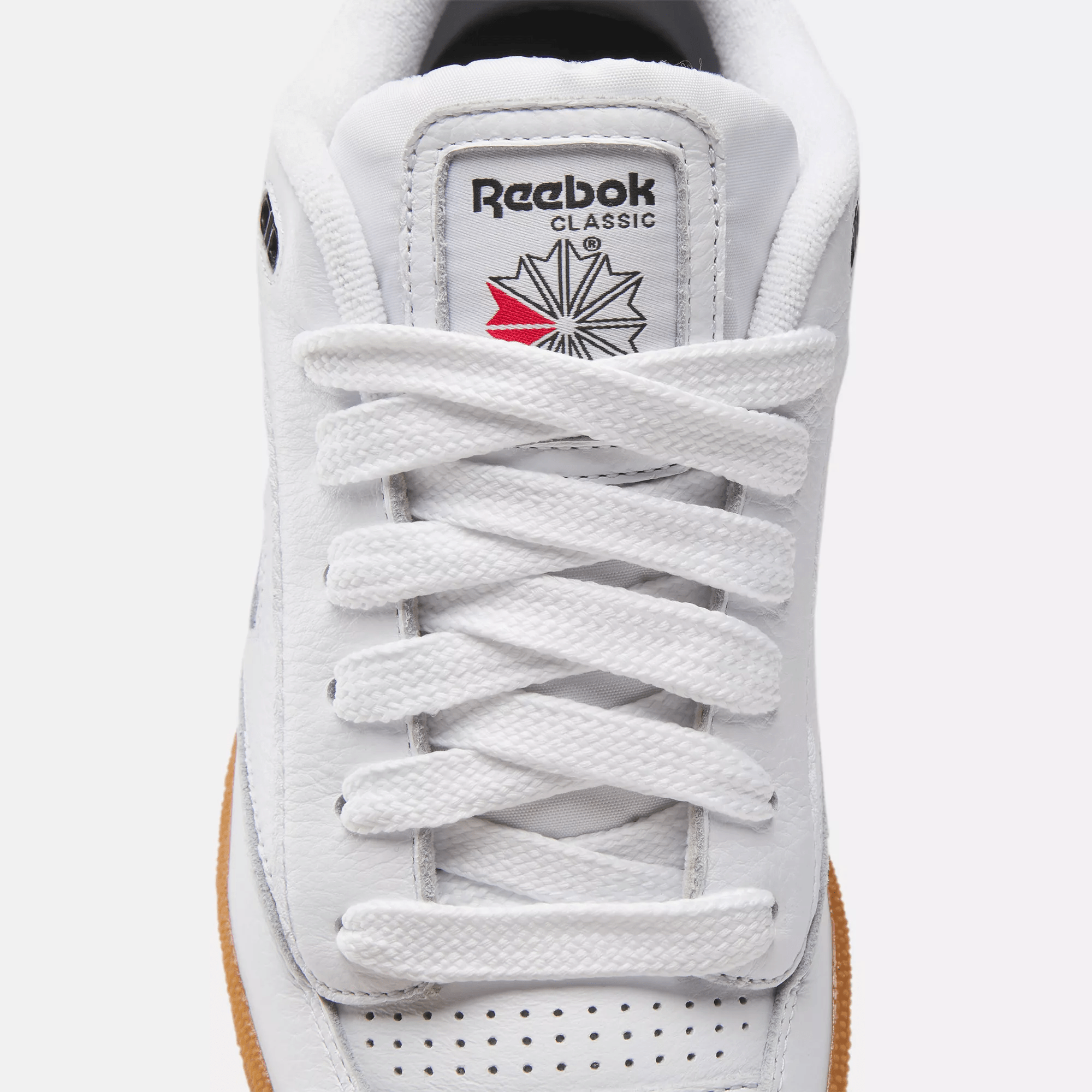 white reebok with gum sole