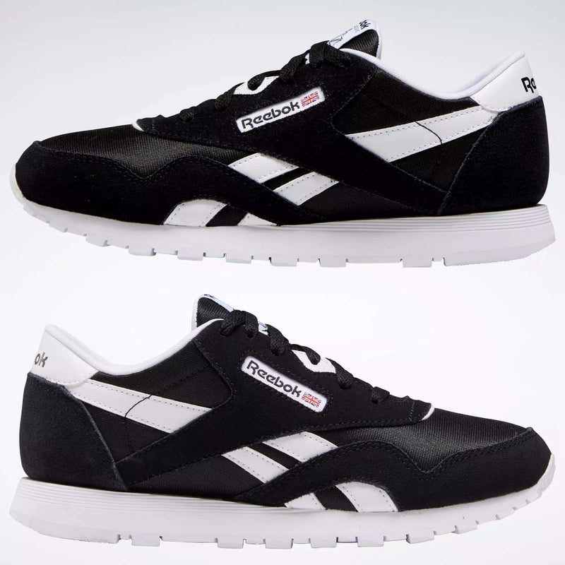 Two pairs of Reebok Classic Nylon Shoes for big kids, featuring black and white colors, white soles, and visible Reebok branding, are displayed side by side against a plain white background.