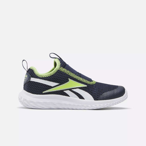 The Reebok Kids' Rush Runner Slip-On Shoes for little kids feature a navy blue and neon yellow design with white accents, mesh upper, pull tabs on tongue and heel, lightweight cushioning, and a white textured sole on a plain light background.