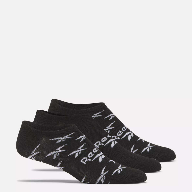 Three pairs of Reebok No-Show Liner Socks, featuring black fabric with white logos and text and moisture-wicking properties, are shown side by side on a white background.