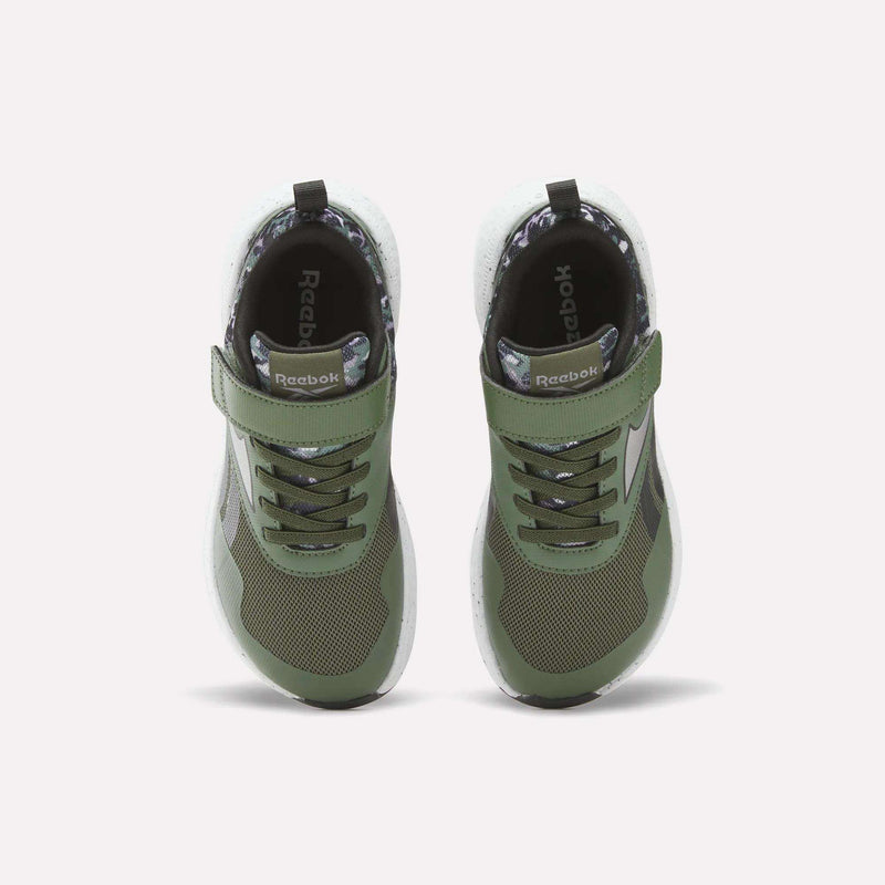 The Reebok Nano Play Stretch Lace and Top Strap Shoes for little kids are shown from above on a white background; they feature green uppers, black soles, white midsoles, mesh details, Velcro straps, and the Reebok logo on the side.