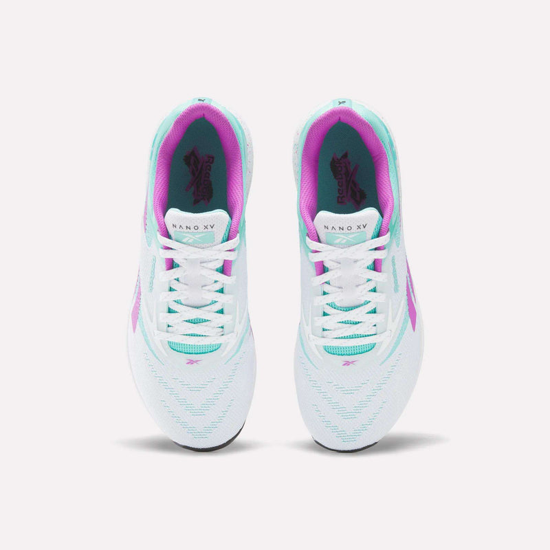 A pair of Reebok Nano X5 Training Shoes in white with teal, purple, and pink accents shown from above on a plain white background.