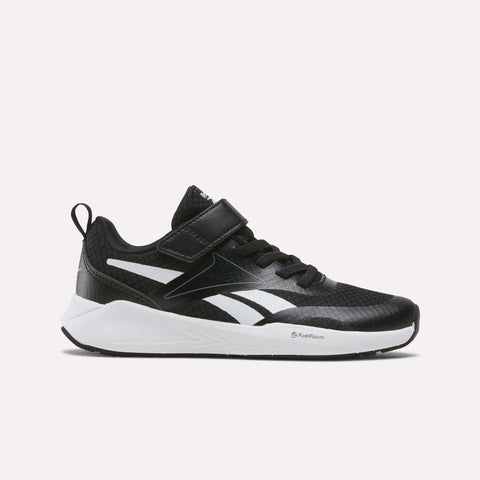 Displayed on a plain white background, the Reebok Energen Running Shoes - Little Kids in Black/White/Grey 3 feature a Velcro strap, pull tab at the heel, and a white sole with white accents—making them perfect for active little ones.