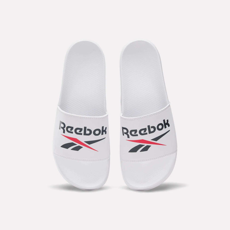 RBK Fulgere Swim Slides by Reebok in white, featuring bold black and red Reebok logos on the slip-on straps, shown side by side on a plain white background.