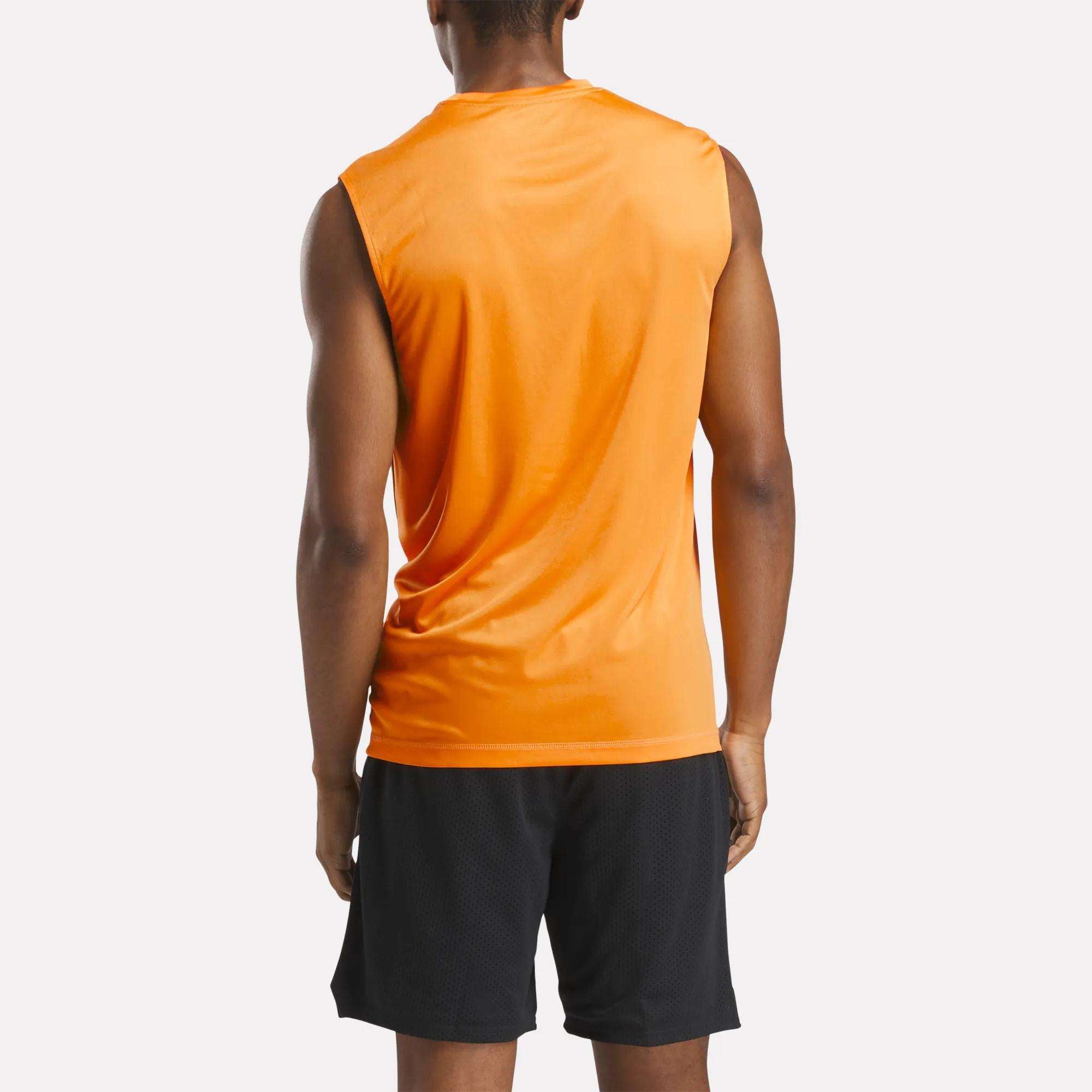 A man is shown from the back against a plain white background, wearing a Reebok Men's Training Sleeveless Tech T-Shirt and black shorts.