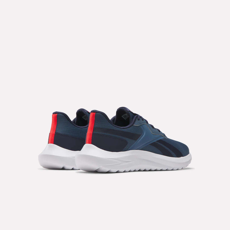 Men's Energen Lux Running Shoes by Reebok in navy blue with white soles and red heel tabs, displayed at an angle on a light background.