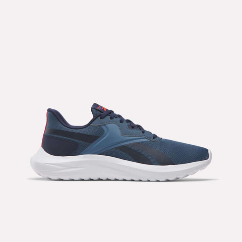 The Men's Energen Lux Running Shoes feature a white sole, dark blue mesh upper, light blue overlays, and red accents on the heel and tongue—perfect lightweight Reebok sneakers for men, shown in profile against a plain light background.