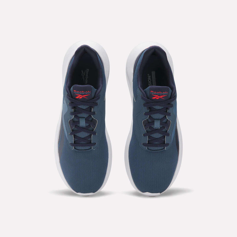 Top view of a pair of blue Men’s Energen Lux Running Shoes by Reebok with white soles and red logos on the tongue, placed side by side on a plain white background. Lightweight sneakers ideal for comfort and style in everyday wear.