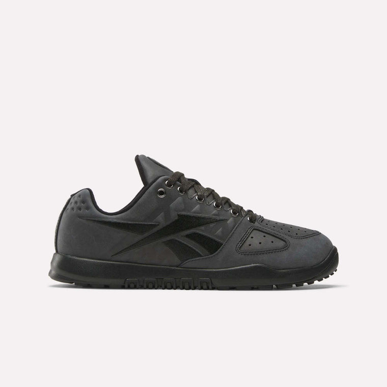 The Reebok Nano 2.0 Training Shoes are black athletic sneakers with black laces, a textured sole, pebbled leather accents, and a stylized logo on the side, shown against a plain white background.