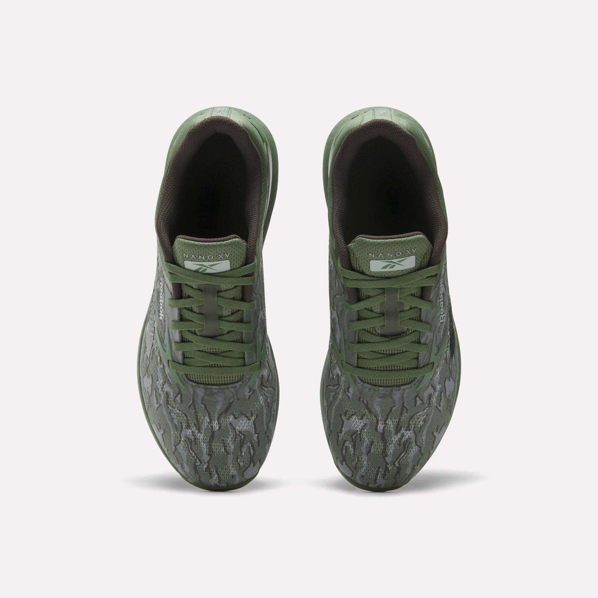 Top view of Reebok Nano X5 Training Shoes for men with green patterned uppers, matching laces, and dark green interiors—these stylish and comfortable pairs are shown side by side on a plain white background.