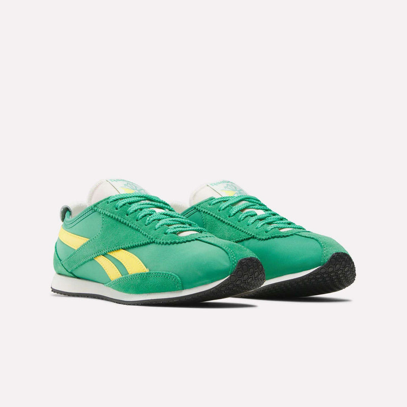 The Reebok R400 Shoes are green low-profile sneakers featuring yellow stripes, lightweight EVA white midsoles, and black textured outsoles, shown on a plain white background.