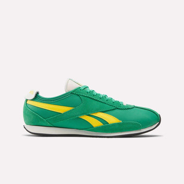The Reebok R400 Shoes feature a green upper with yellow stripes and accents, green laces, and a lightweight EVA white sole, displayed in side view on a plain white background.