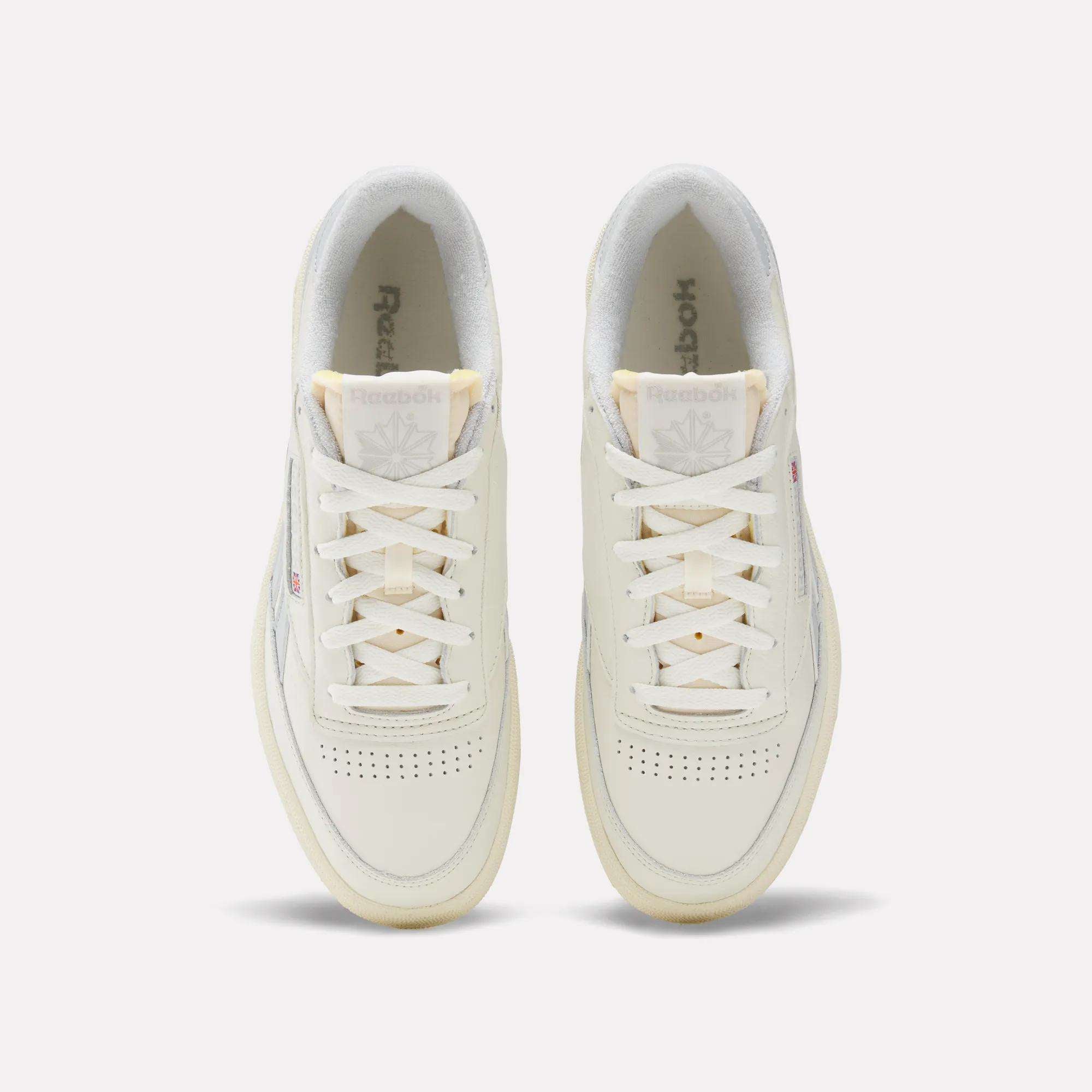 A pair of Reebok Club C Revenge Vintage Shoes in white, crafted from premium full-grain leather.