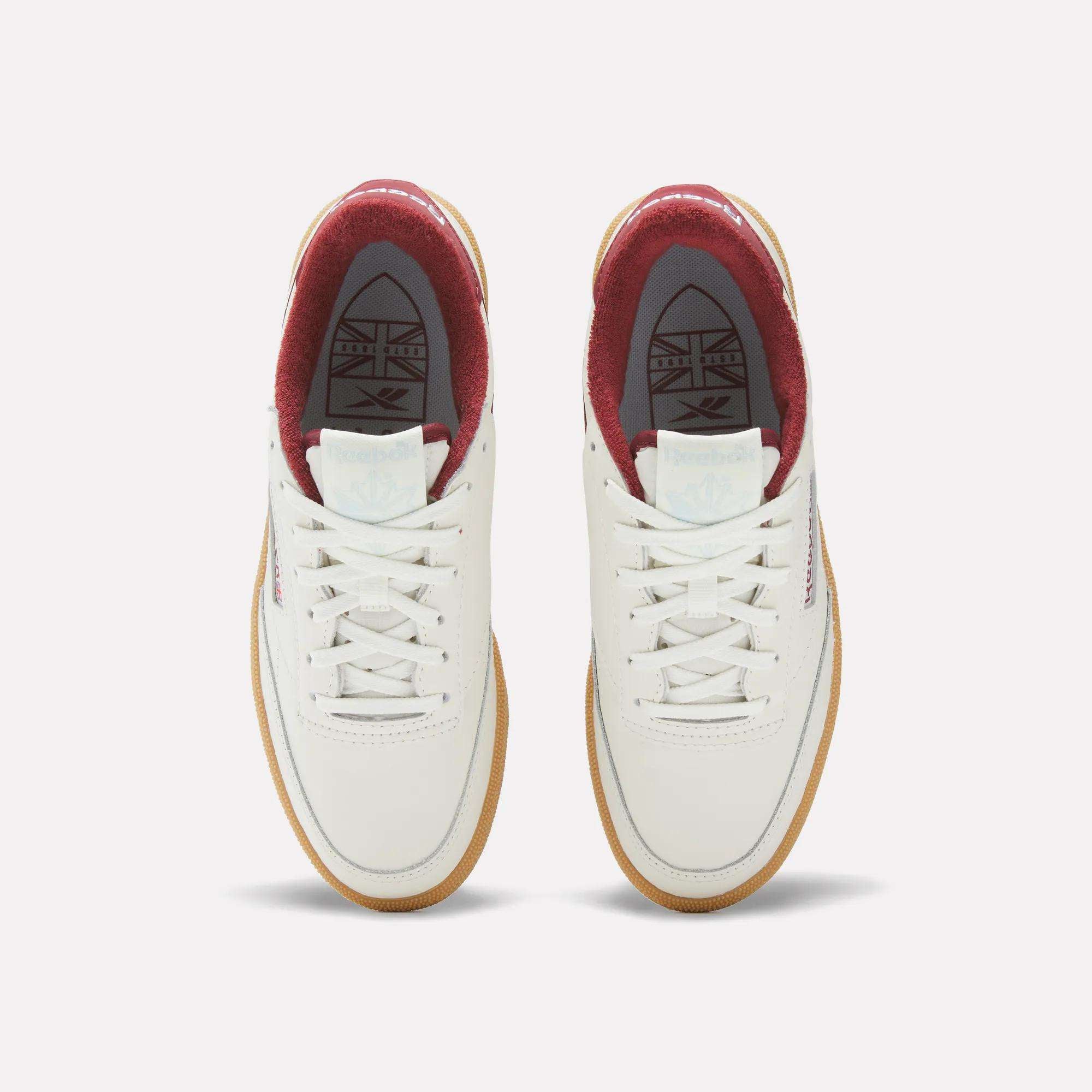 The Women's Club C Golf Shoes by Reebok are white, water-resistant leather golf shoes with a sleek spikeless outsole for comfort on and off the course.