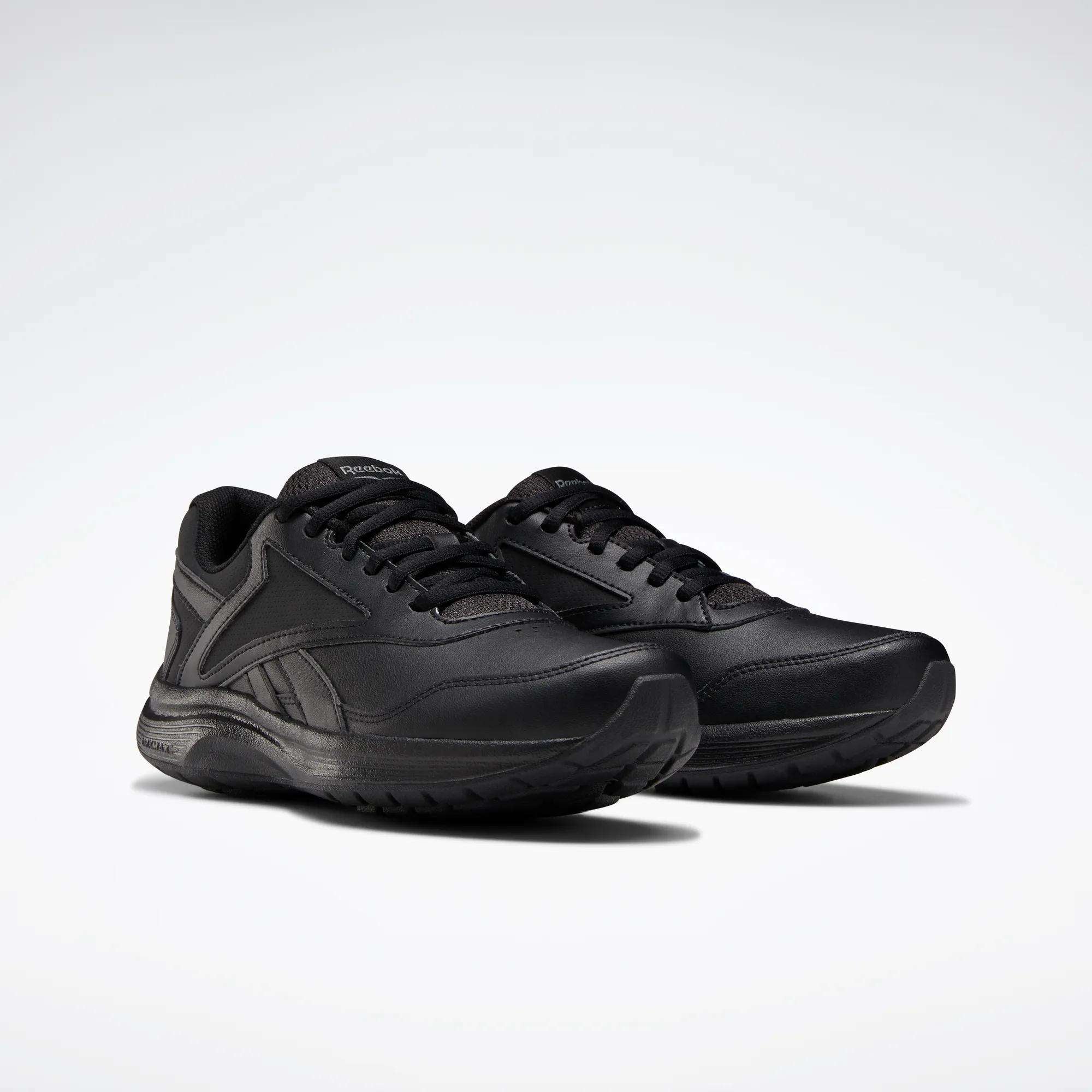 A pair of Reebok Women's Walk Ultra 7 DMX Max Walking Shoes in black, designed with DMX cushioning for all-day comfort.