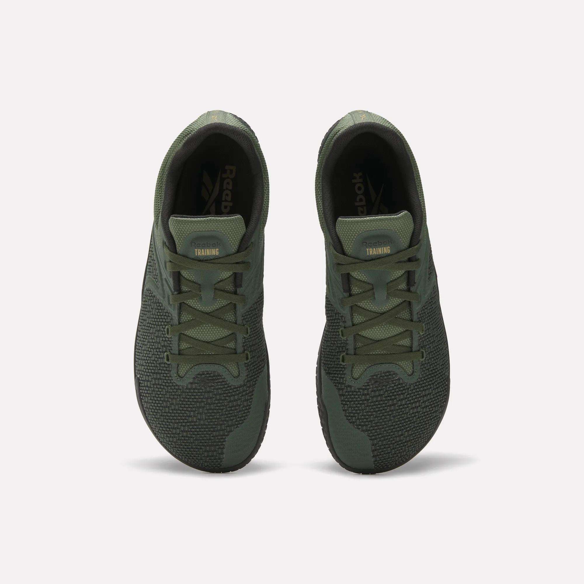 A pair of olive green Reebok Nano Zero Training Shoes viewed from above, highlighting the laces, mesh texture, and Reebok branding on the insoles, set against a plain white background.