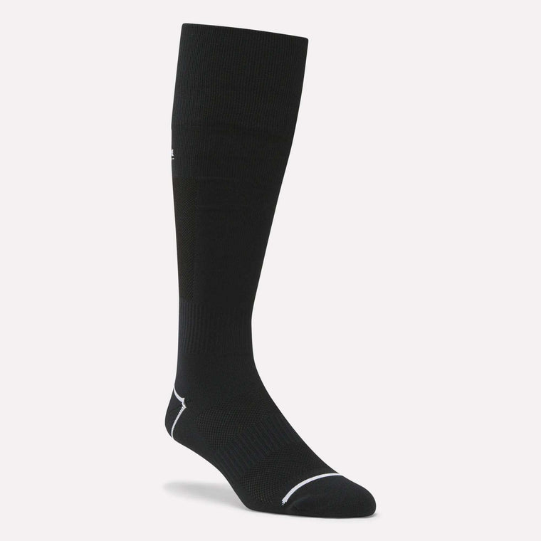 A single Reebok Men's Soccer Crew Sock in black with white accents at the toe and heel, shown upright on a light background. These moisture-wicking socks are ideal for active lifestyles.