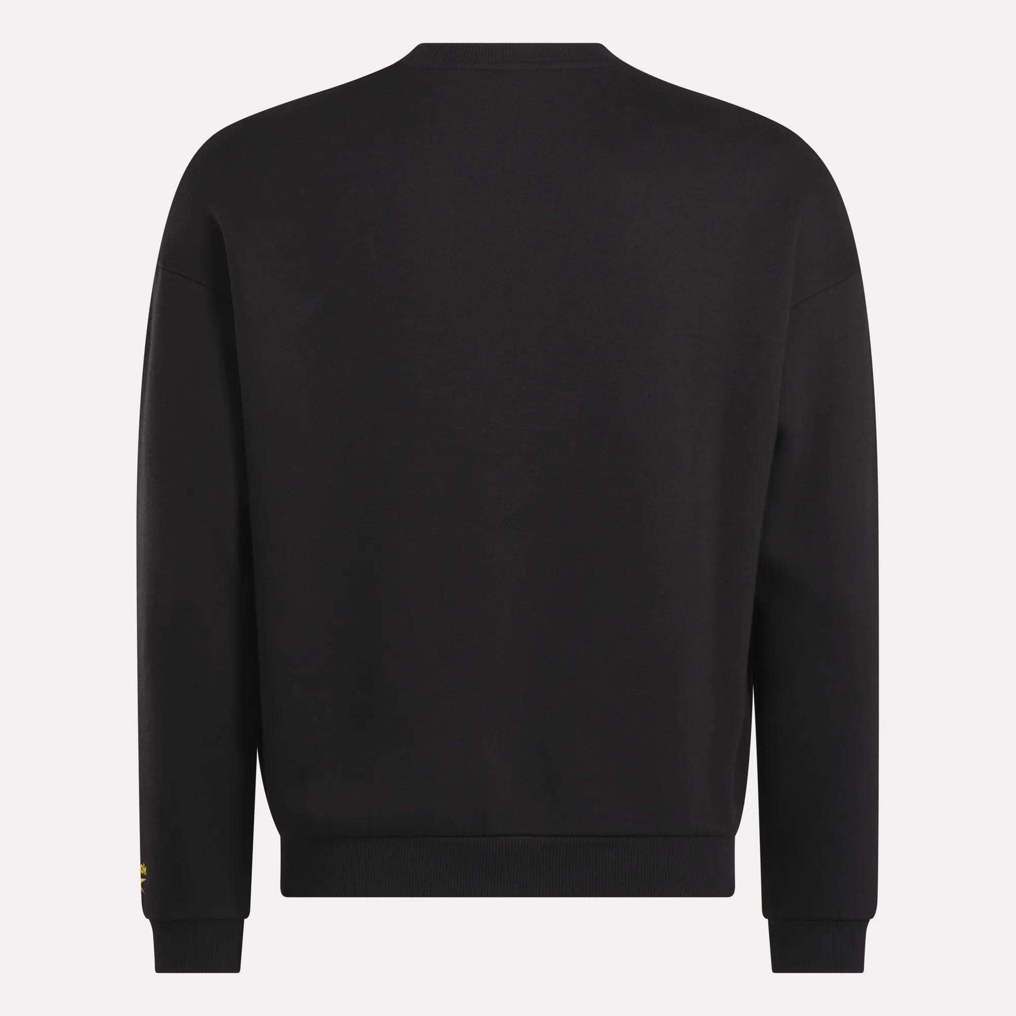 The Reebok Men's Cottle Sweatshirt, shown from the back in plain black, features ribbed cuffs and waistband.