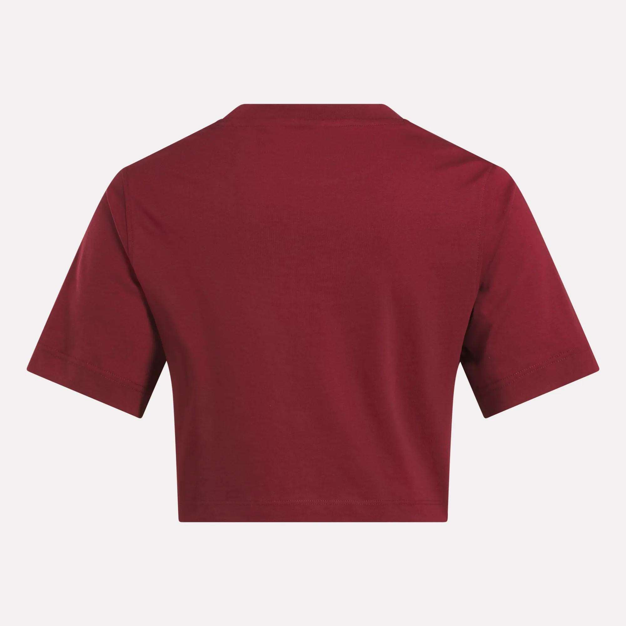 A Reebok Women's Two-Color Logo Crew Cropped Short Sleeve Tee is shown from the back against a white background.