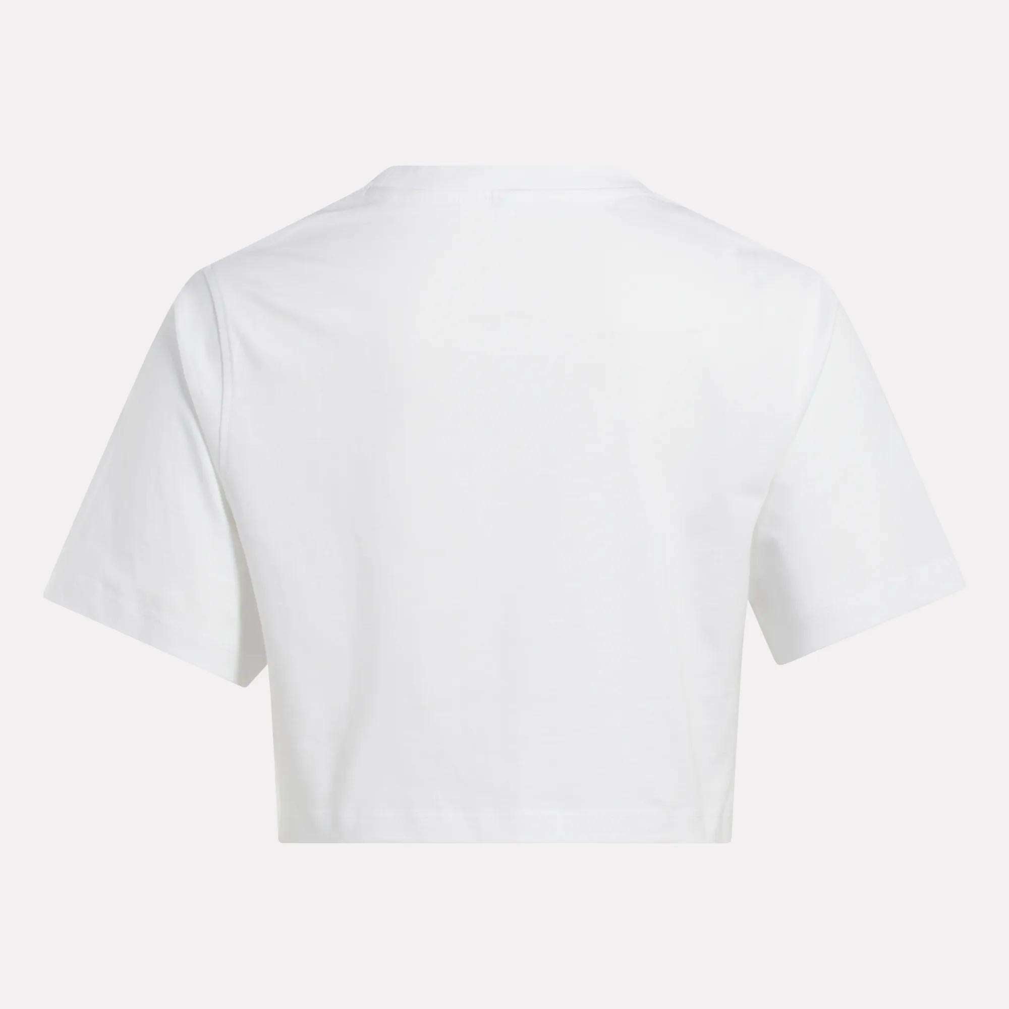 A Reebok Women's Two-Color Logo Crew Cropped Short Sleeve Tee is shown from the back against a white background.