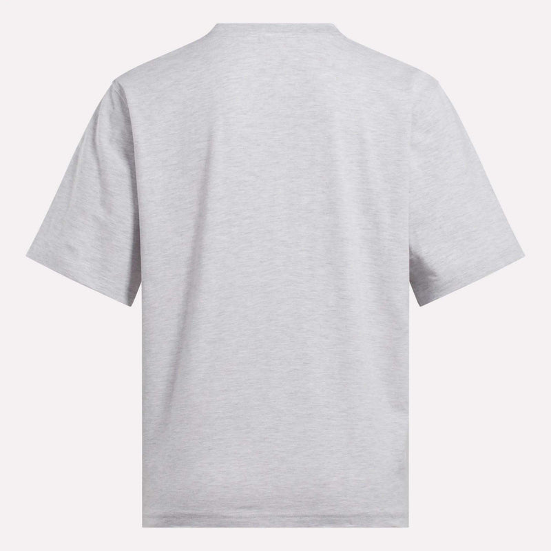 The Reebok Women's Big Logo Oversized Crew Short Sleeve Tee is shown from the back in light gray, featuring an oversized fit and simple crew neckline against a white background, with no visible designs or logos.