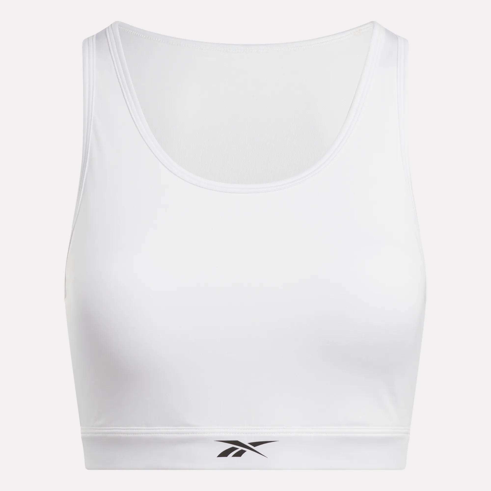 The Reebok Women's Core High-Impact Bra features a scoop neckline, fitted sweat-wicking design, and a small black logo on the front band to keep you comfortable and supported during intense workouts.