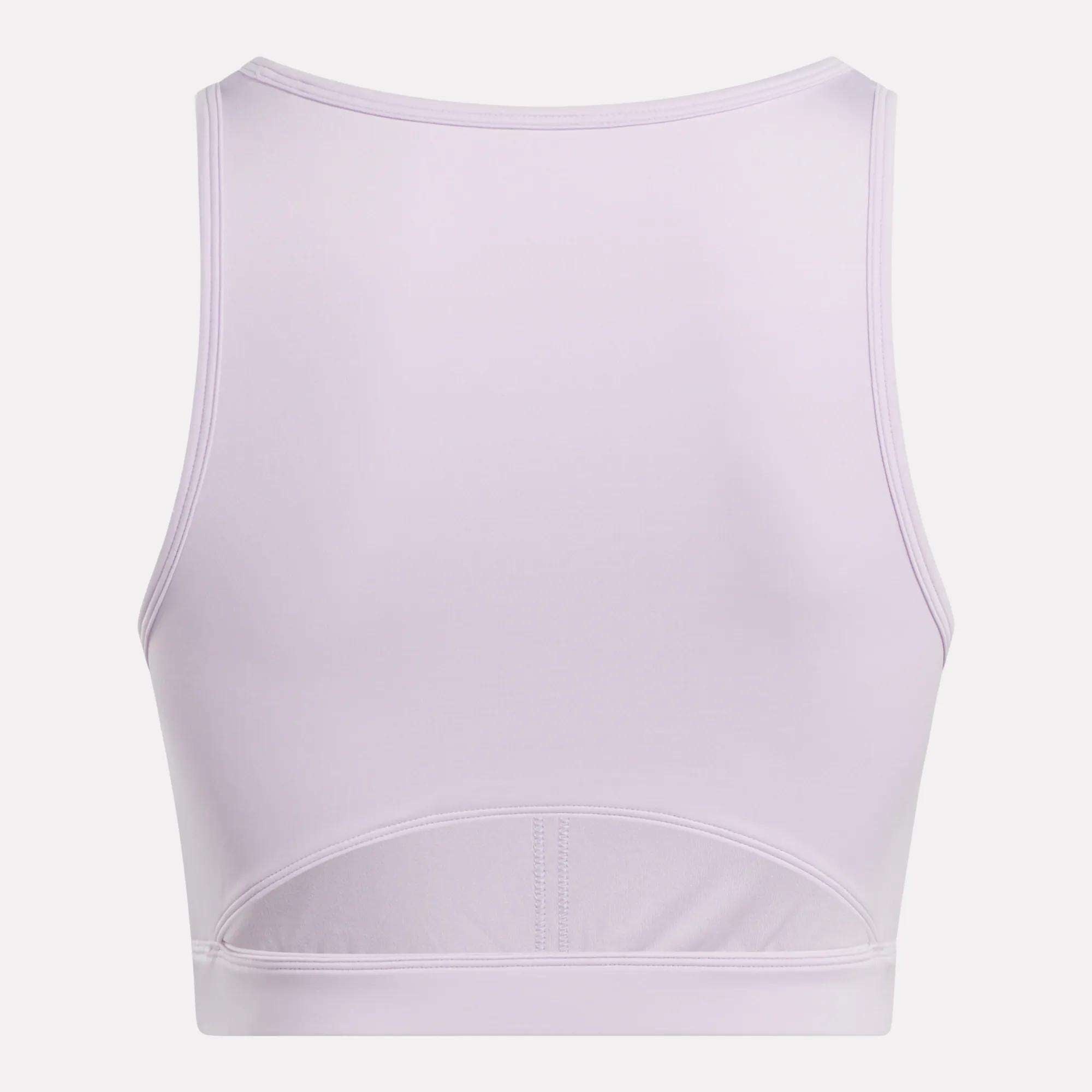 Back view of the Reebok Women's Core High-Impact Bra in light lavender, featuring a racerback and subtle lower-back seams. Smooth, stretchy, sweat-wicking fabric makes it perfect for intense training sessions.