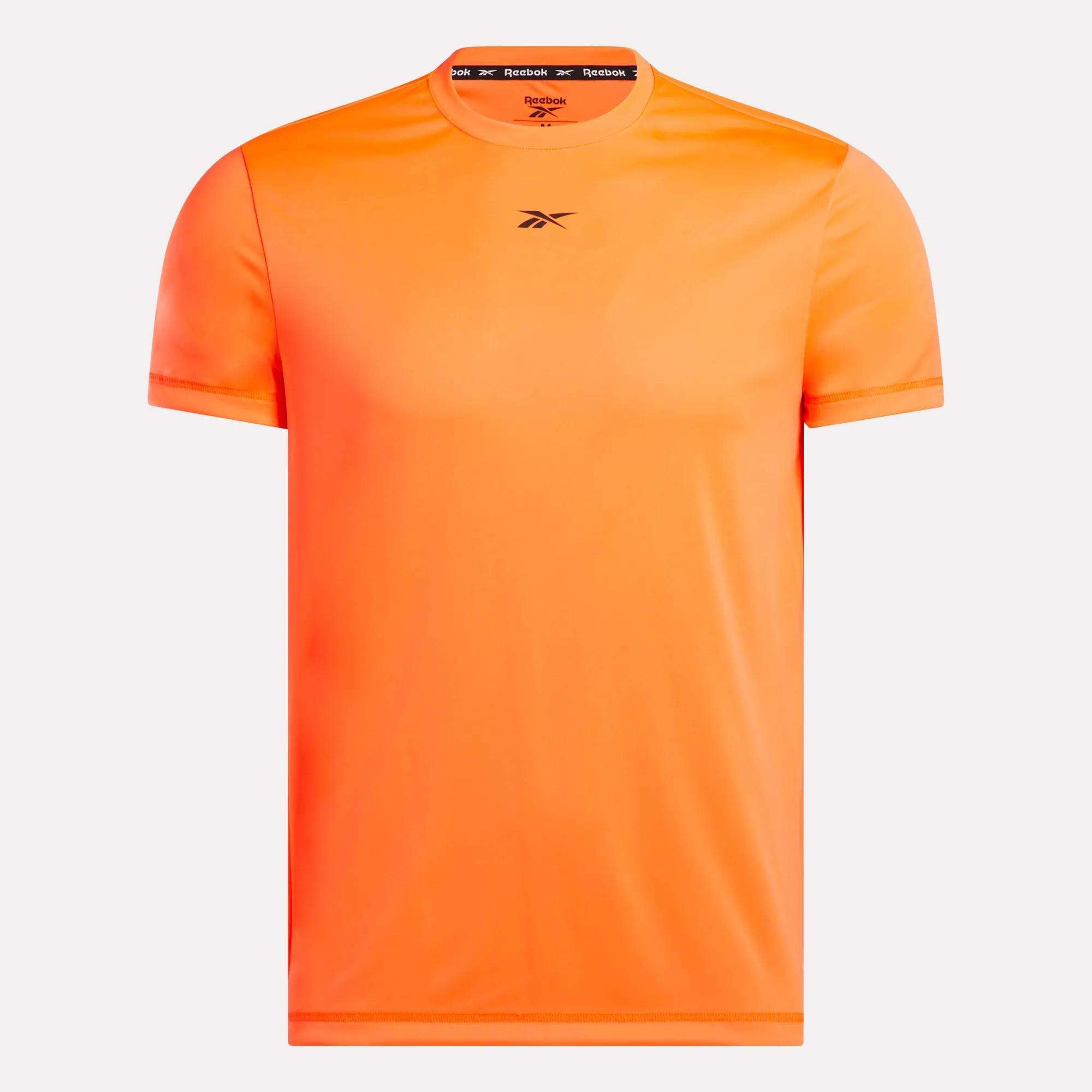 Men's ID Train Short Sleeve Tech Tee by Reebok in bright orange with a small black chest logo, shown on a plain white background.