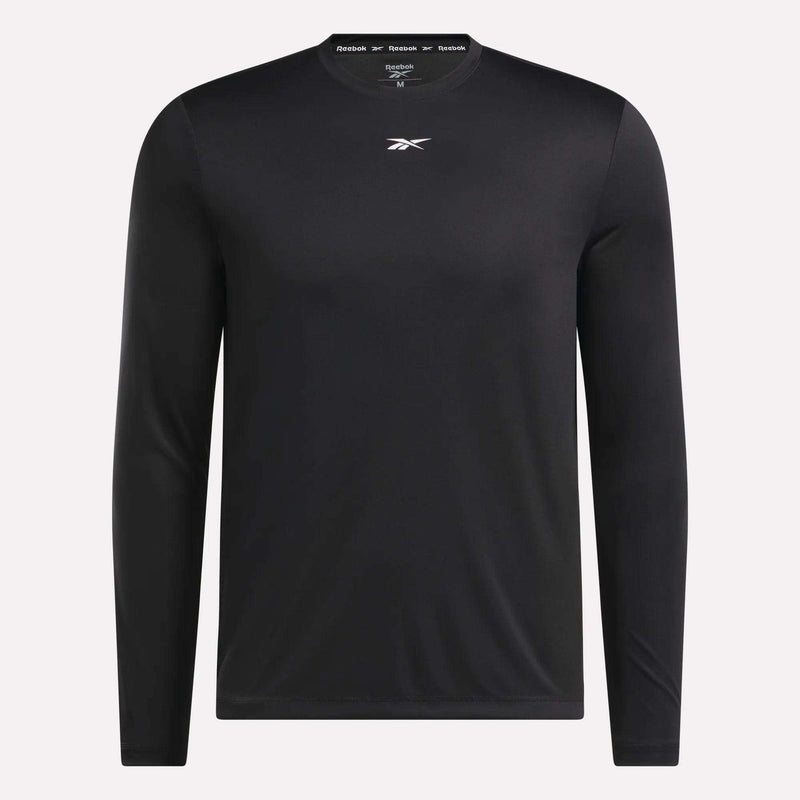 The Reebok Men's Long Sleeve Tech T-Shirt in plain black features a small white chest logo, perfect for cold weather workouts and shown on a light background.