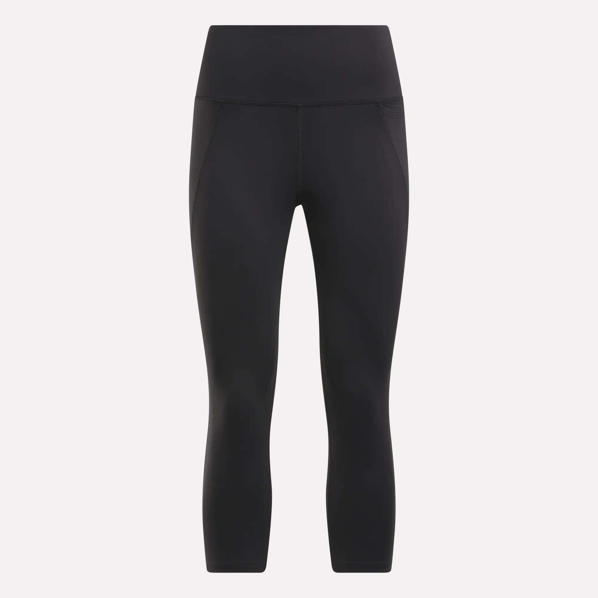 Women's Lux 3/4 High-Rise Tights by Reebok, featuring a high-rise waistband and visible stitching, shown from the front on a plain light background.