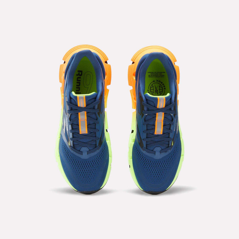 A pair of Reebok Men's FloatZig 2 Running Shoes in blue with orange accents and yellow-green soles, featuring Superfloat+ cushioning, viewed from above on a white background.
