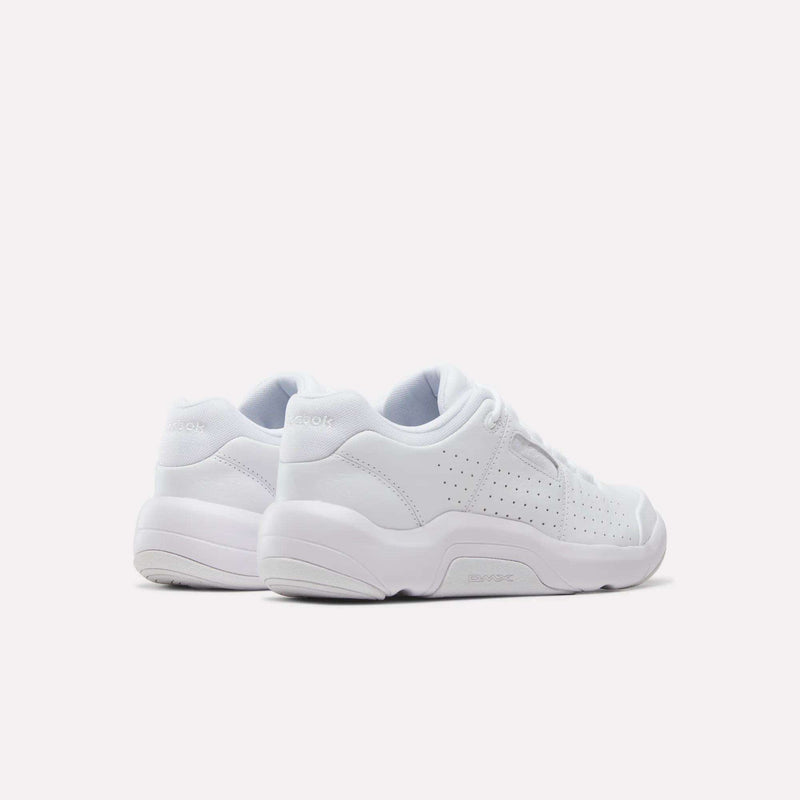 Back view of white Reebok DMX Comfort+ Classic Shoes, featuring premium leather, perforated side panels, and thick rubber soles with dynamic air cushioning.