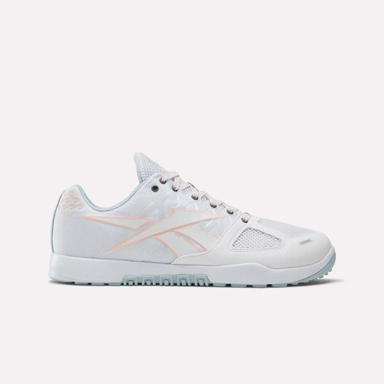 The Reebok Men's Nano 2.0 Training Shoes feature a white low-top design with light pink accents and mesh panels, perfect for functional fitness. Displayed on a plain white background.