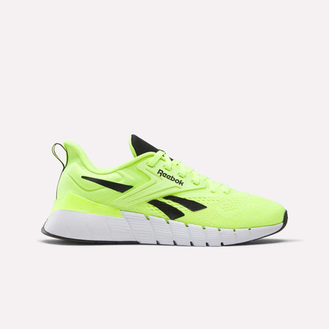 The Men’s Nano Gym Training Shoes by Reebok feature neon yellow uppers with black accents, a white sole, and a black side logo, shown on a plain white background.