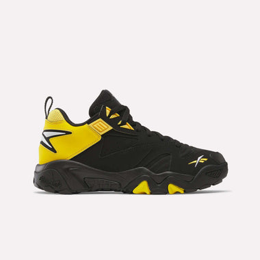 The Reebok Brutus Low Shoes feature a black and yellow design with mesh and leather panels, chunky sole, yellow heel accents, and white branding—offering street-ready style for everyday wear.