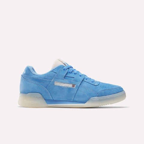 The Reebok Workout Plus Shoes feature a classic blue design with a white sole, ideal for fans of '80s fitness style.