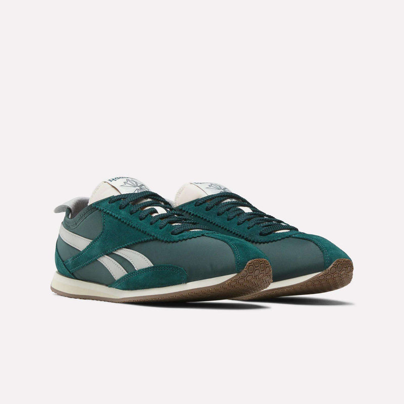 A pair of Reebok R400 Shoes in teal and gray, featuring suede and mesh panels, white soles, gum rubber outsoles, and the Reebok logo on the sides. Displayed on a white background.