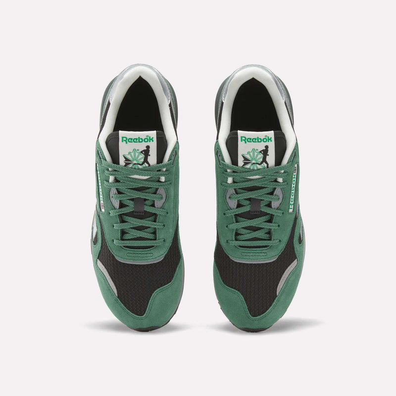 A top-down view of Reebok Classic Nylon 89 Shoes in green and black, with white midsoles, green suede overlays, black mesh uppers, and Reebok logos on tongue and side—delivering the perfect vintage running shoe look.
