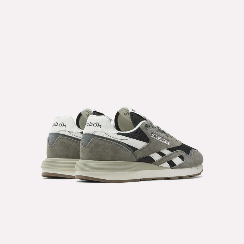 A pair of Reebok Classic Nylon 89 Shoes in gray, black, and white are displayed on a plain white background, angled with the heels forward and toes outward.