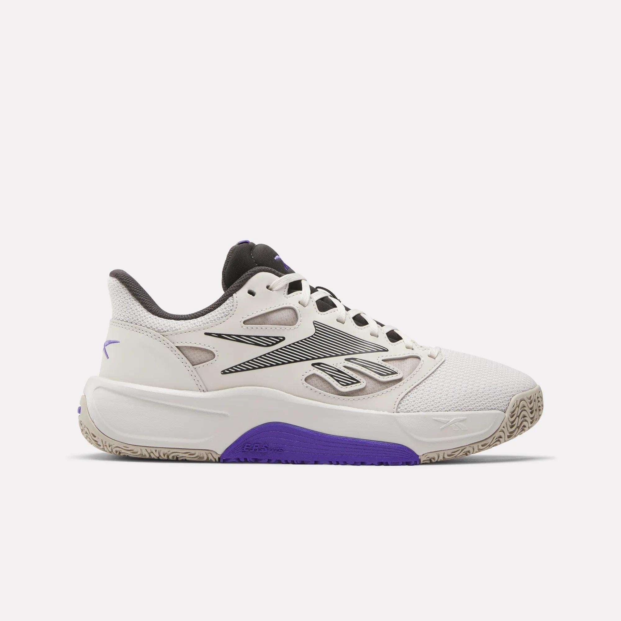The Reebok Engine LT Shoes are white athletic sneakers with black and purple accents, a mesh upper, black laces, textured sole, visible logo, and purple midsole detail for modern style and cushioned comfort.