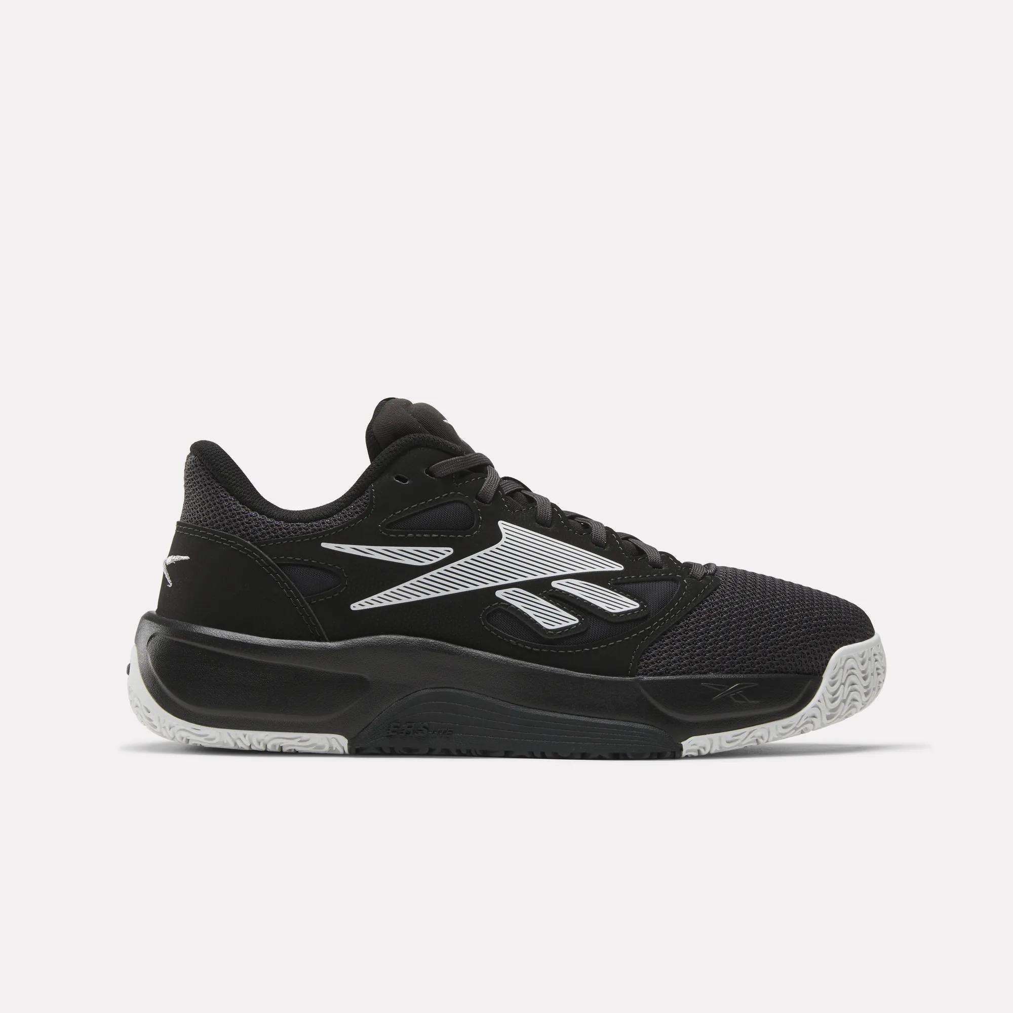 Reebok Engine LT Shoes are black and white low-cut athletic sneakers with a mesh toe, patterned outsole, white side logo and detailing, plus a light gray sole designed for superior grip.
